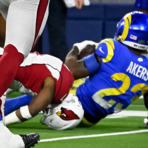 Los Angeles, CA - January 17:Cardinals Budda Baker, #3, suffered an injury as his head was tucked under Rams Cam Akers, #23, during fourth quarter action in the NFC Wild Card game at SoFi Stadium Monday, January 17. 2022. The Rams defeated the Cardinals 34-11.   (Photo by David Crane/MediaNews Group/Los Angeles Daily News via Getty Images)