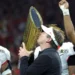 Kirby Smart holding the National Championship trophy