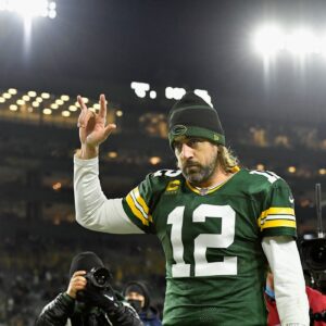 Aaron Rodgers walks off the field after NFC Divisional Round loss.