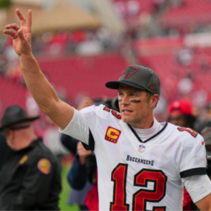 Tom Brady waves to the crowd after a Buccaneers home game.